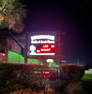 Lee Sharp's name in lights on Boondock's sign